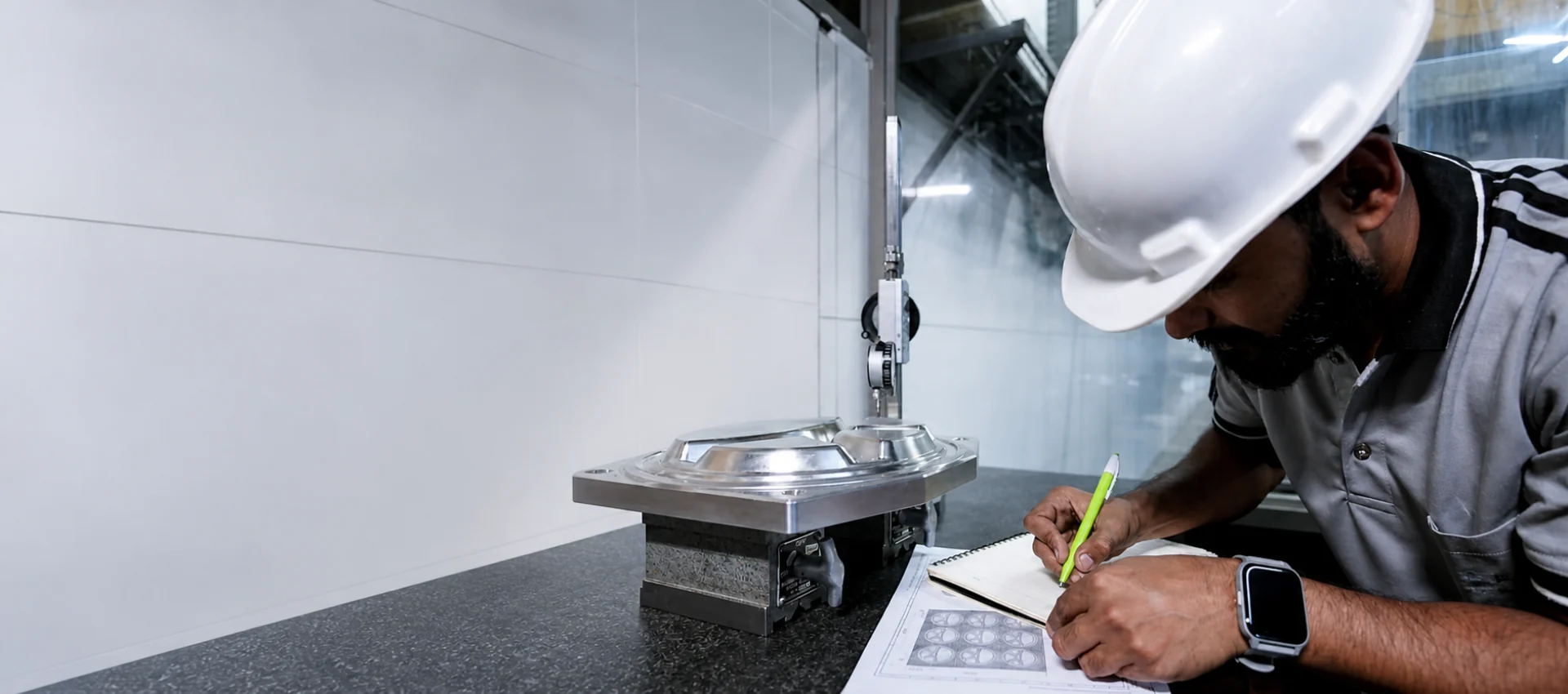 PTPL engineer inspecting a precision die